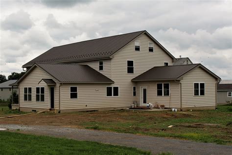 burnished slate metal roof white house|burnished metal roof.